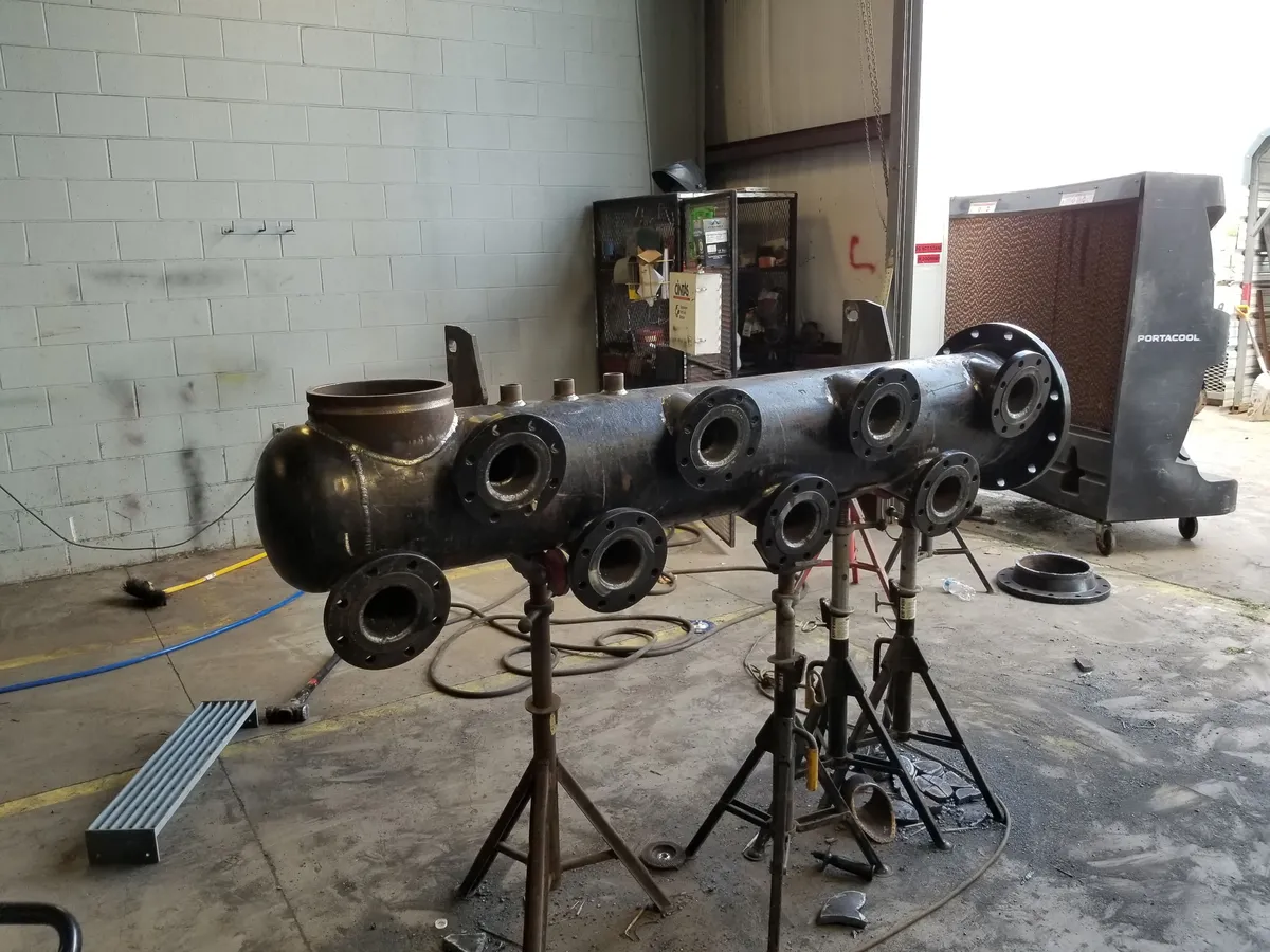 Fabricated manifold for industrial service